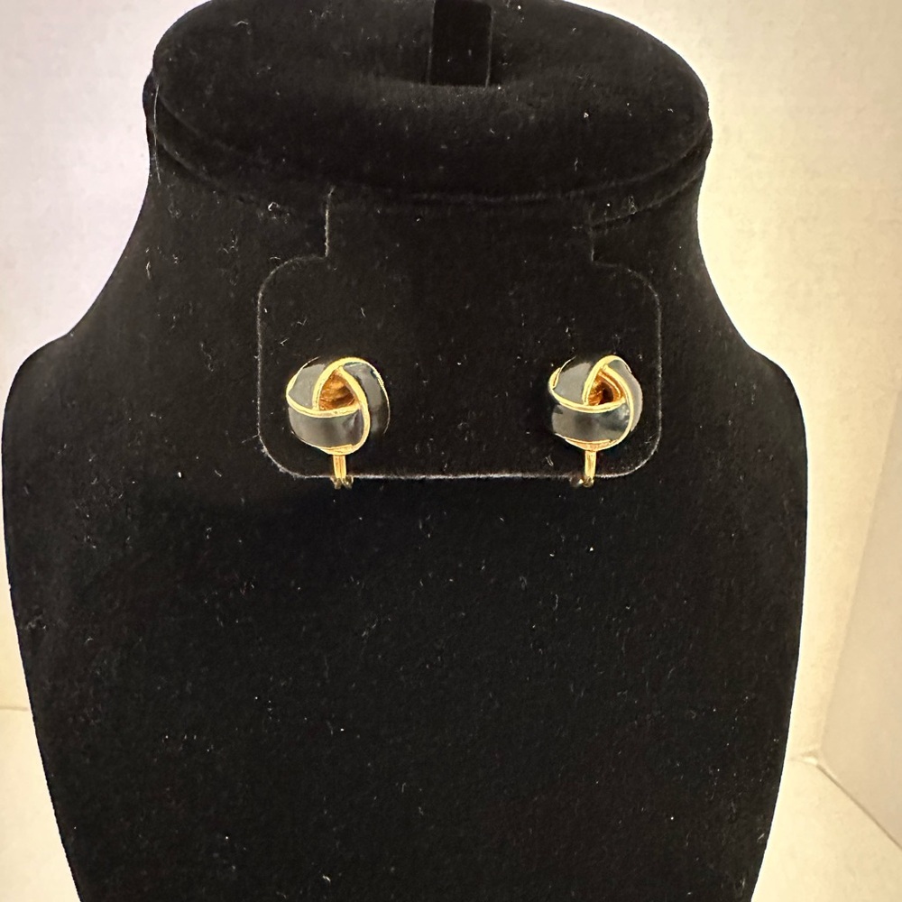 Monet black enamel on gold tone knot earrings clip on